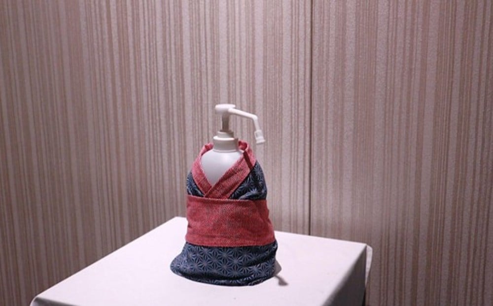 おもてなしの心で装飾されたアルコール消毒液