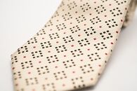 【受注生産】匠の技術で織り上げるシルク１００％のモザイク小紋柄ネクタイ（ライトイエロー）